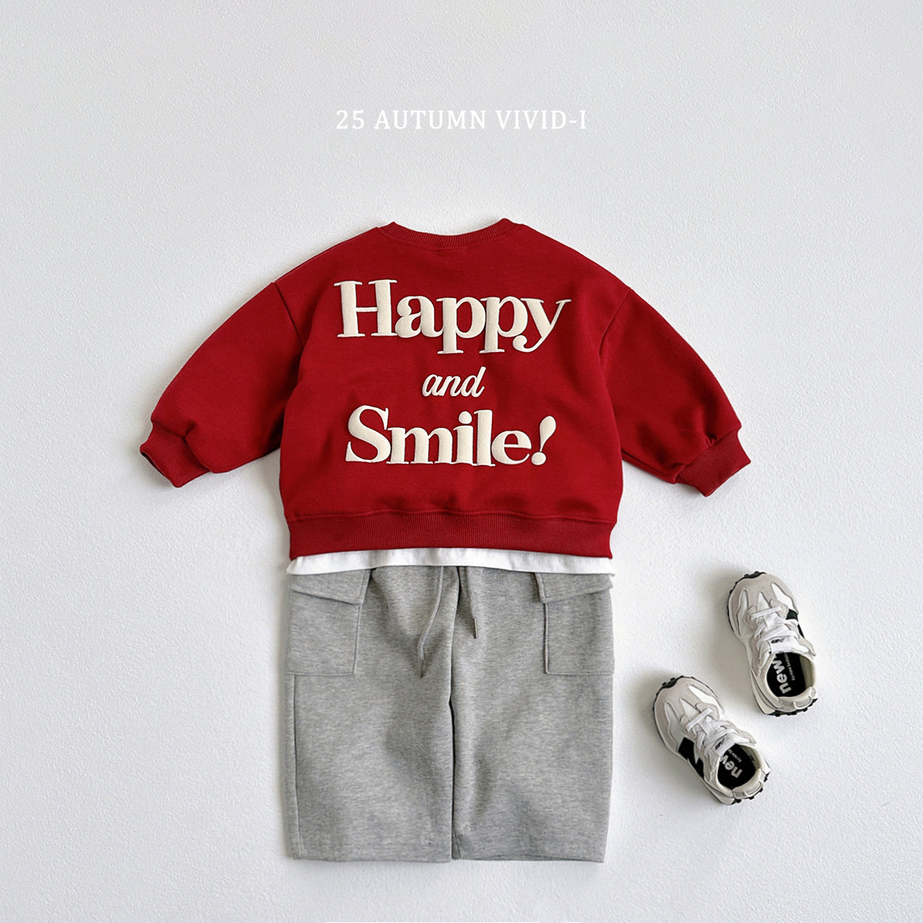 Happy Embossed Sweatshirt