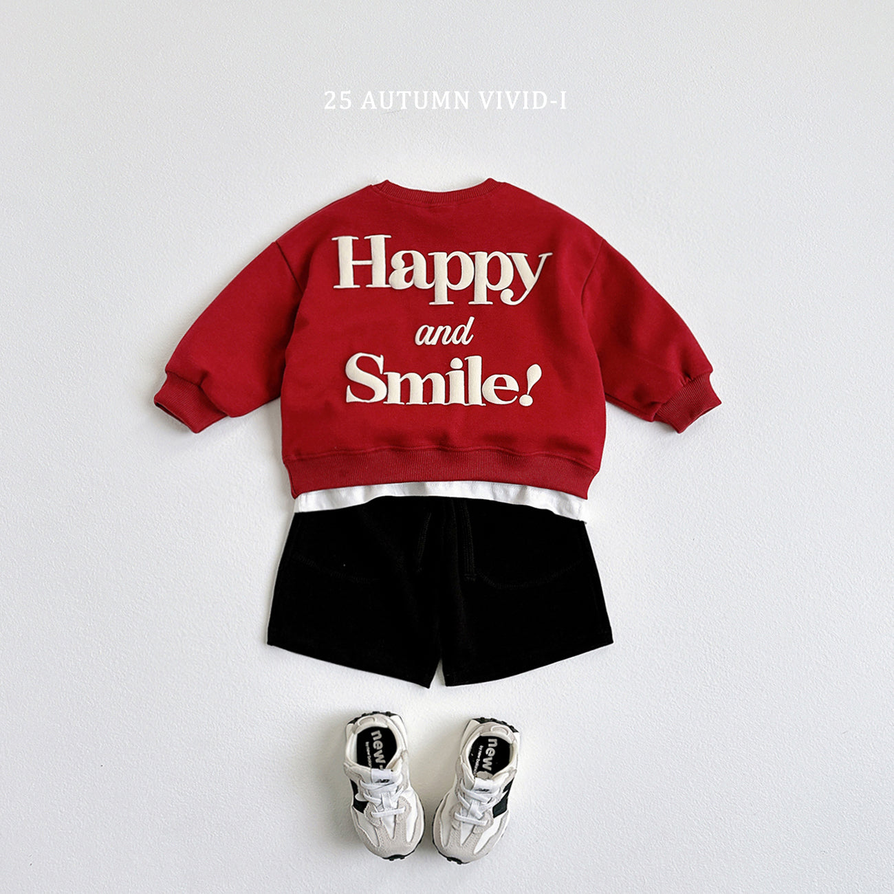 Happy Embossed Sweatshirt