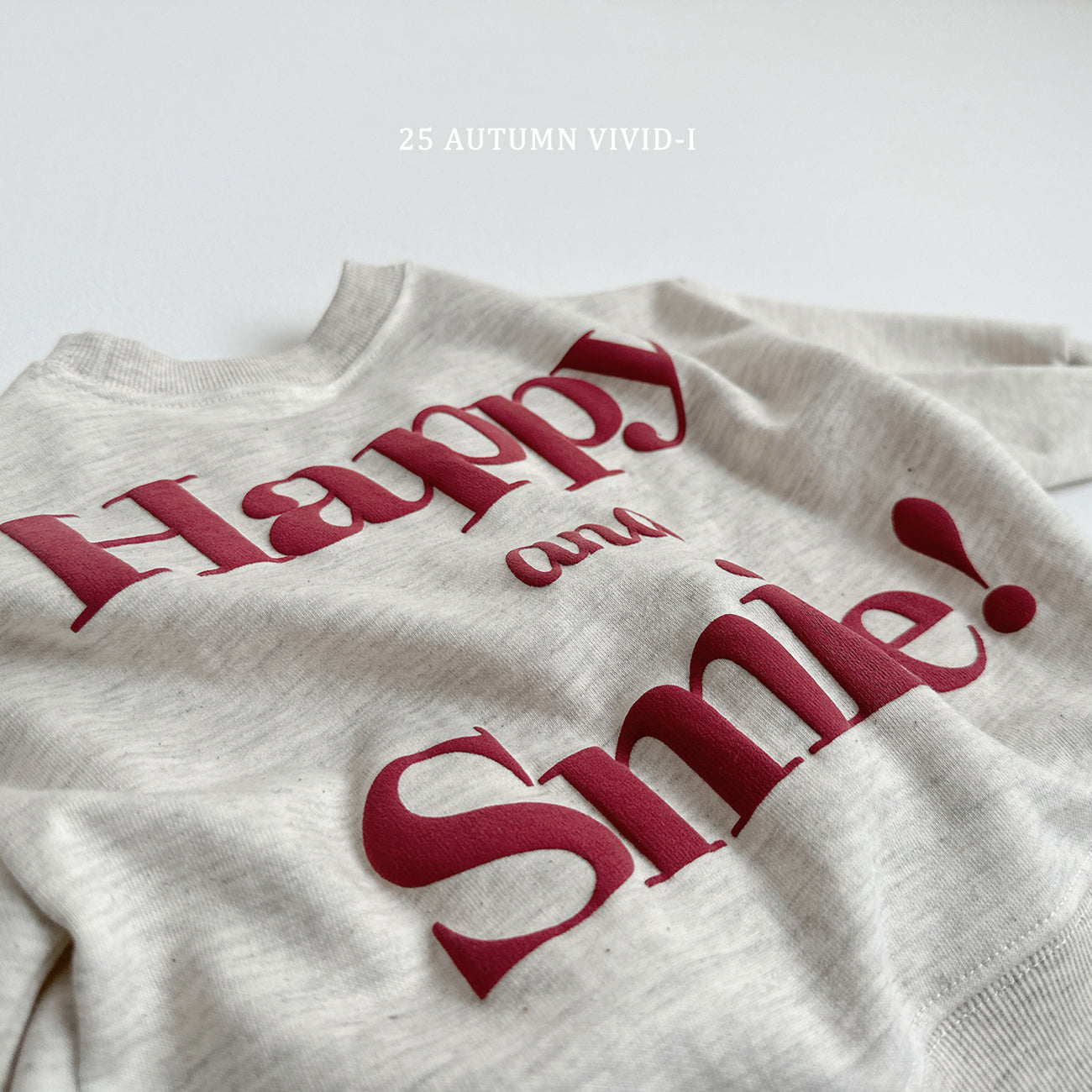 Happy Embossed Sweatshirt