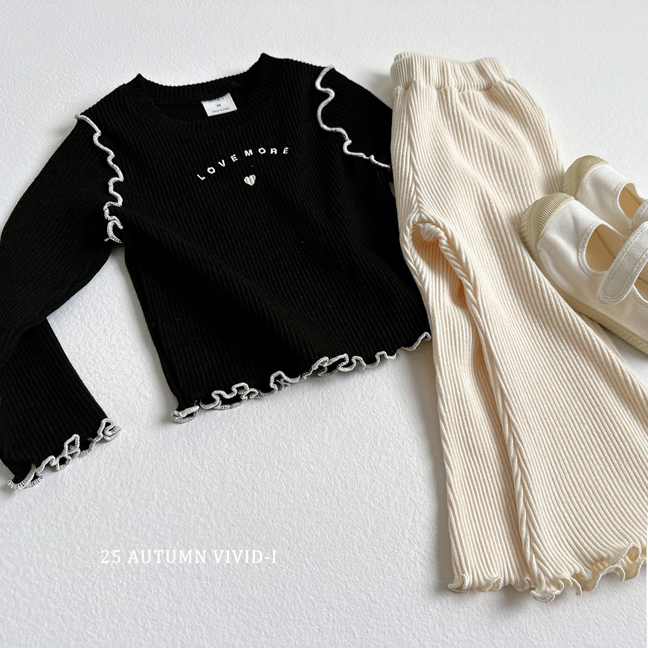 Ribbed Loose-fit Flared Pants