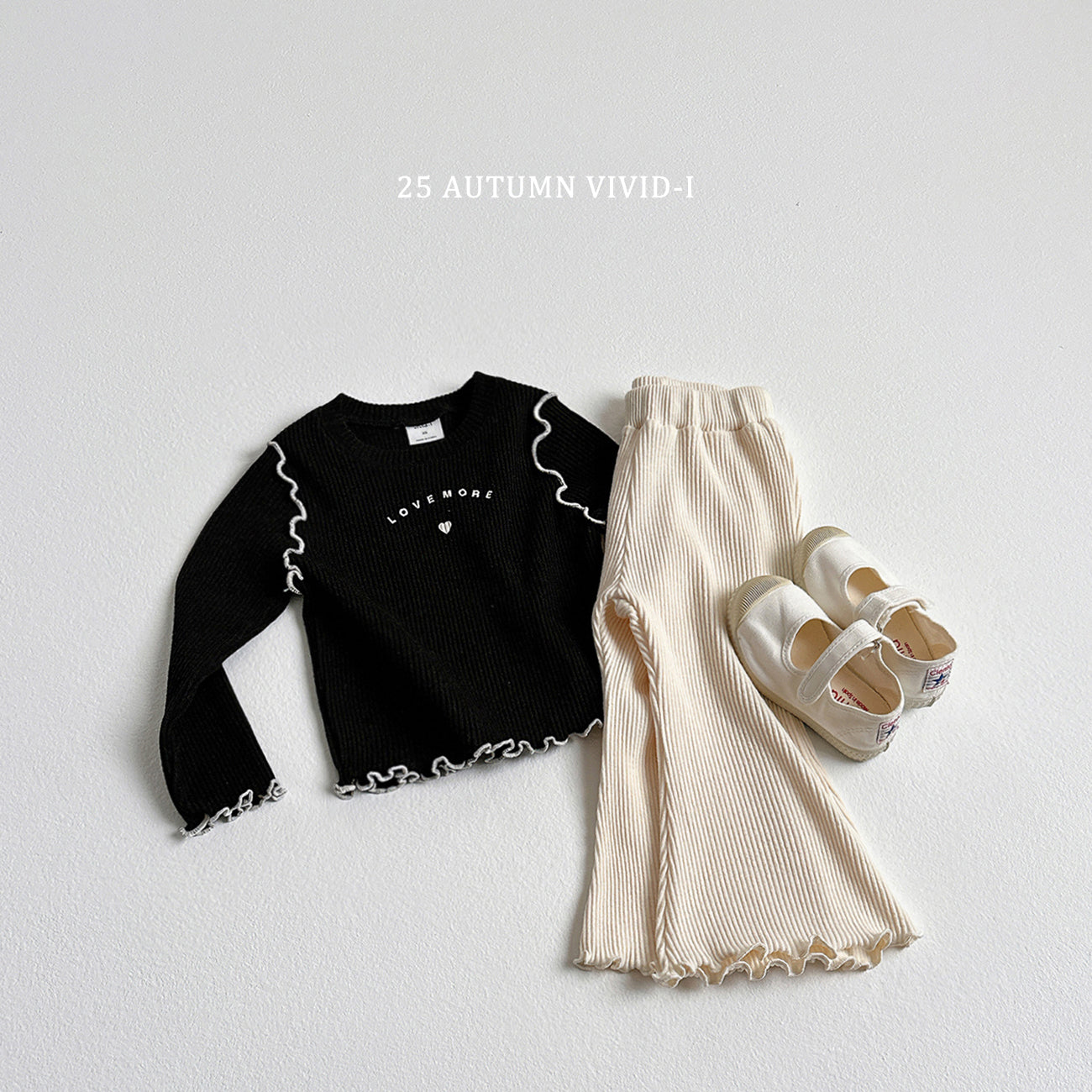 Ribbed Loose-fit Flared Pants